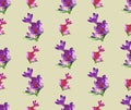 Seamless floral pattern with purple and pink crocuses of polygons on a yellow background