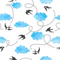 Seamless flying swallows and blue watercolor clouds pattern