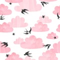 Seamless flying swallows and pink watercolor clouds pattern