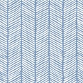 Seamless geometric chevron pattern with zigzag diagonal white stripes on a blue background. Herringbone design. Striped texture. Royalty Free Stock Photo