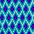 seamless geometric ikat embroidery on blue background