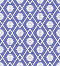 Seamless geometric pattern in blue and white colors with rhombus and flowers. Vector design Royalty Free Stock Photo