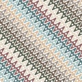 Seamless geometric pattern with diagonal wavy multicolor lines in vintage colors. Abstract background.Geometric striped texture. Royalty Free Stock Photo