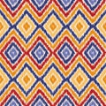 Seamless geometric pattern, ikat fabric style.