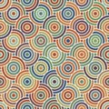 Seamless geometric pattern with Overlapping multicolored concentric circles on a white background. Retro style. Vector texture. Royalty Free Stock Photo