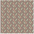 Seamless geometric pink and green pattern on brawn.