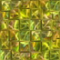 Seamless gold texture with protruding cubes. Glass squares stick out unevenly from the surface.