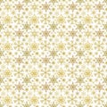 Seamless golden snowflakes pattern tile. Christmas background and fabric