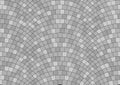 Seamless gray texture of radial street pavement. Repeating circle pattern of grey cobble stone background Royalty Free Stock Photo