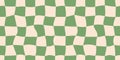 Seamless green checkerboard pattern. Repeating distorted checkered texture. Groovy trippy abstract background. Vintage Royalty Free Stock Photo