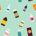 Seamless green medical pattern with medicine bottles, sprays and pills.Vector