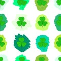 Seamless green painted shamrocks