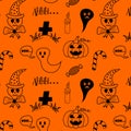 Seamless Halloween Pattern with doodle ghosts, skull, candle, candies and grave. Royalty Free Stock Photo