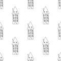 Seamless hand drawn doodle contour houses pattern in line art style Royalty Free Stock Photo