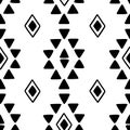 Seamless hand drawn geometric tribal pattern with rhombuses and triangles. Vector navajo design. Royalty Free Stock Photo