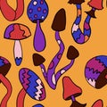 Seamless hand drawn pattern with hippie groovy mushrooms in orange purple blue red colors. Retro vintage 1960s 1970s