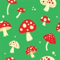 Fly agarics colored seamless pattern. Royalty Free Stock Photo