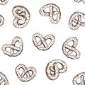 Seamless hand drawn pretzels pattern in vintage style isolated on white background. ink drawing sketch of Brezel traditional