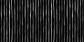 Seamless hand drawn vertical pinstripe pattern made of fine wonky white stripes on black background