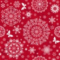 Seamless vector Christmas pattern with white snowflakes, butterflies Royalty Free Stock Photo