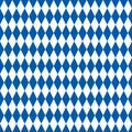 Seamless harlequin pattern background in blue.