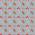 Seamless holiday pattern with gingerbread men, candy canes, pink gift boxes, and snowflakes Royalty Free Stock Photo