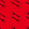 Seamless horror pattern with grill fork black silhouettes. Red background. Kitchen tools barbeque sketch