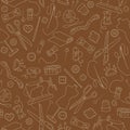Seamless illustration on the theme of sewing and knitting, a bright outline on a brown background Royalty Free Stock Photo