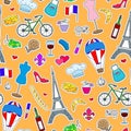 Seamless illustration on the theme of travel in the country of France, simple icons patches, the coloured symbols on a orange back