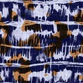 Seamless indigo dyed bandana texture. Blue orange stain woven cotton effect background. Repeat Indonesian batik resist