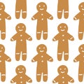 Seamless isolated pattern with tasty gingerbread man cookies silhouettes. Brown tasty bakery treat on white background Royalty Free Stock Photo