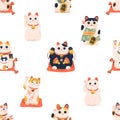 Seamless Japanese pattern with maneki-neko cats. Endless Chinese background with lucky kitty dolls. Repeating texture Royalty Free Stock Photo