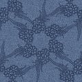 Seamless jeans background with black floral pattern.
