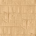 Seamless 4k photo texture of folded and dented cardboard paper Royalty Free Stock Photo