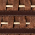 Seamless 4k photo texture material of brown leather pattern with rope insert and straps Royalty Free Stock Photo
