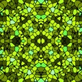 Seamless kaleidoscopic mosaic yellow-green tile pattern