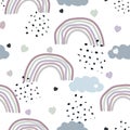 Seamless kids pattern with doodle pastel rainbows, hearts, dots and clouds