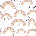 Seamless kids pattern with doodle pastel rainbows, hearts, dots