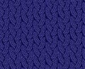 Seamless knitted braid pattern. Woolen fabric.Christmas Blue winter warm sweater. Royalty Free Stock Photo