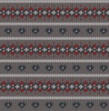 Seamless knitted pattern on grey background Royalty Free Stock Photo