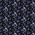 Seamless lace pattern of abstract flowers and curls on a black background.