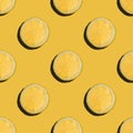 Seamless lemon slice pattern on yellow