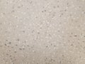 Seamless light brown terrazzo with white and gray random size pebble / seamless pattern / backgropund texture