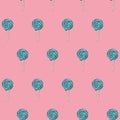 Seamless lollipop pattern on pink background.