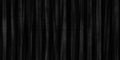 Seamless luxury black velvet theater curtains or fabric folds, a tileable texture background Royalty Free Stock Photo