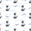 Seamless marine pattern with cartoon cat Sailor and seagulls