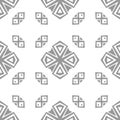 Seamless monochromatic decorative pattern. Grey and white geometric tiling background