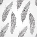 Seamless monochrome pattern with feathers