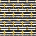 Seamless nautical pattern with golden anchors and ship wheels on white black striped background.