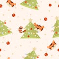Seamless New Years pattern. Tiger and Christmas tree with balls and garlands on a white background with stars. Vector Royalty Free Stock Photo